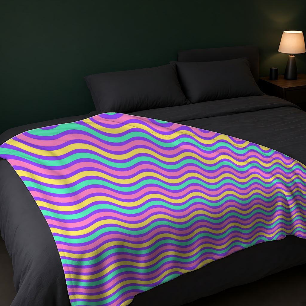 Wide Wave Interference Sherpa Fleece Blanket across the foot of a dark bed