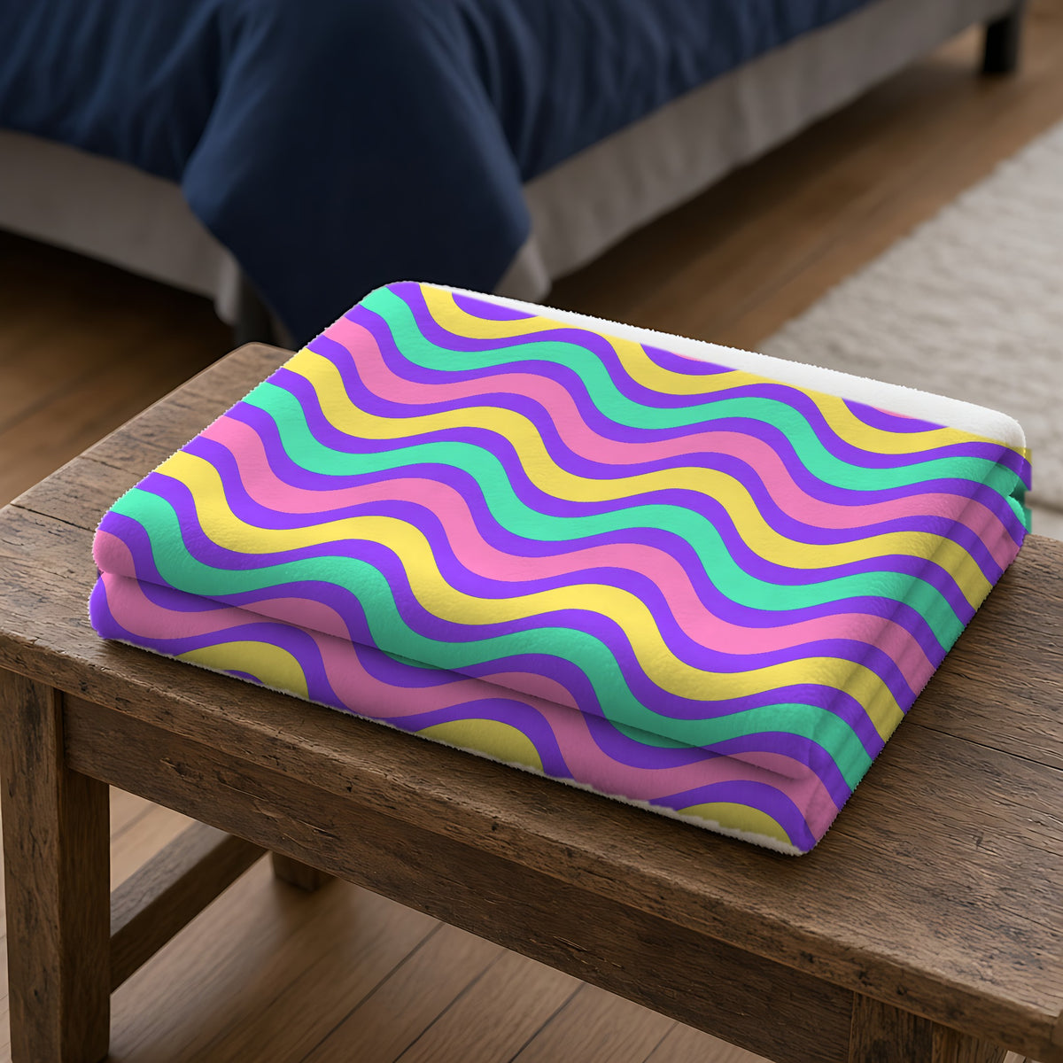 Wide Wave Interference Sherpa Fleece Blanket folded on a wooden bench