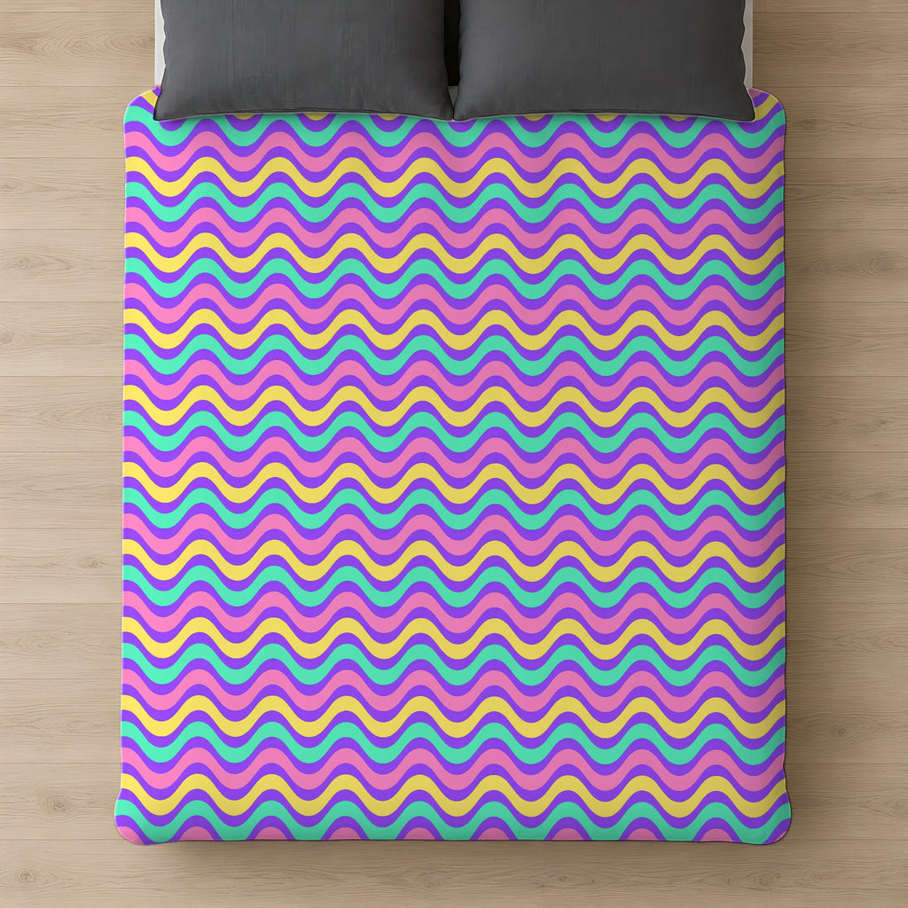 Wide Wave Interference Comforter on a bed, seen from above