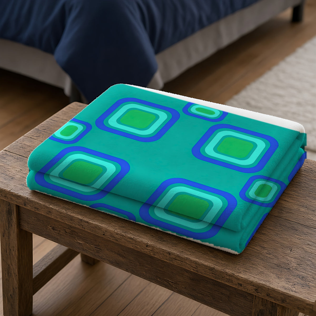 Big Ripple Squares Sherpa Fleece Blanket folded on a wooden bench
