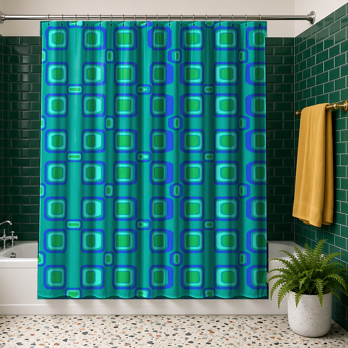 Big Ripple Squares Shower Curtain in the Ocean Jewel palette, hanging in a bathroom with emerald tiles