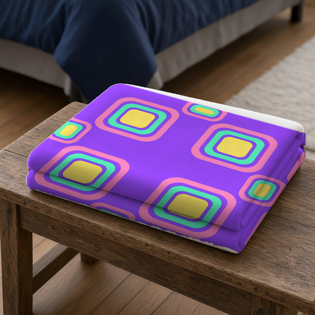 Big Ripple Squares Sherpa Fleece Blanket folded on a wooden bench