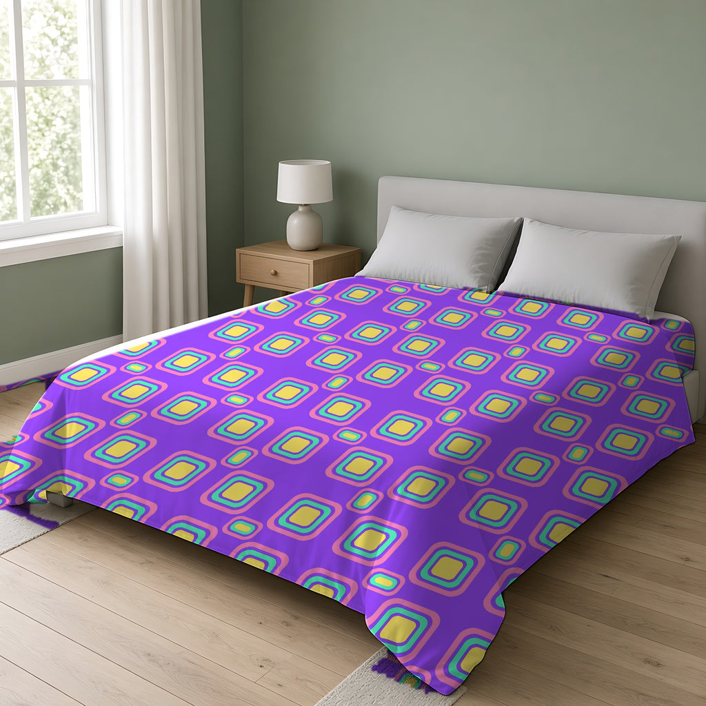 Big Ripple Squares Comforter on a double bed in a bright sage-green bedroom
