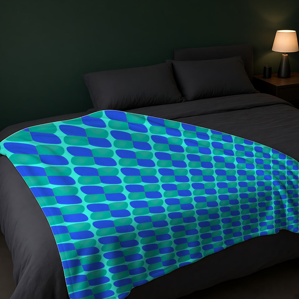 Bold Bulge Checker Sherpa Fleece Blanket across the foot of a dark bed