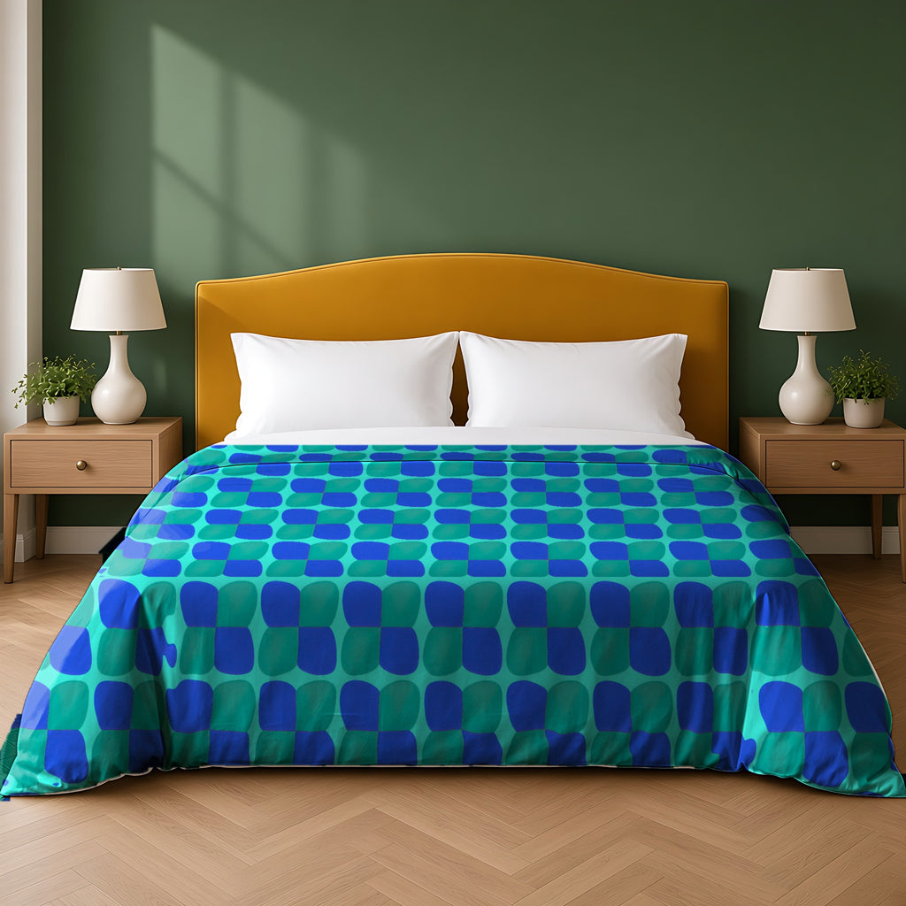 Bold Bulge Checker Cotton Duvet Cover in the Ocean Jewel palette, on a bed with a mustard headboard against a forest-green wall