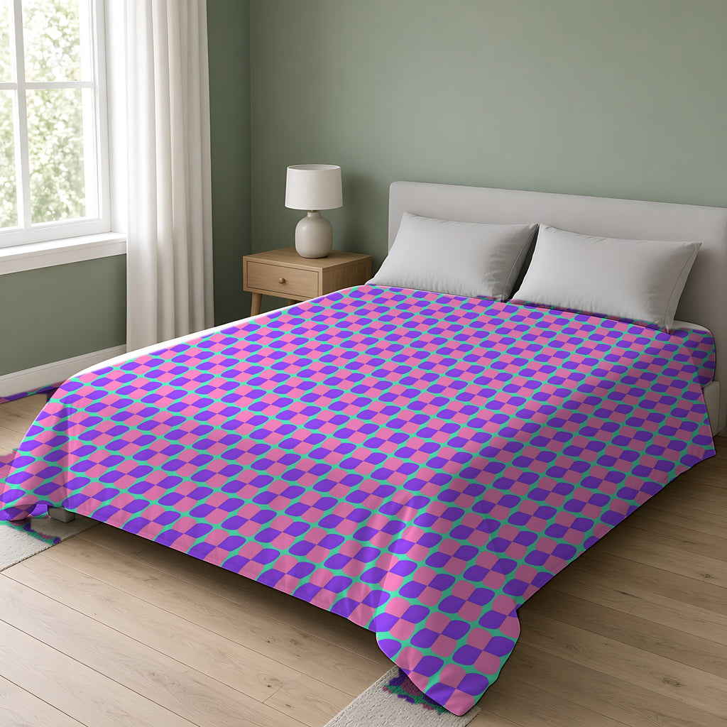 Bold Bulge Checker Cotton Duvet Cover on a double bed in a bright sage-green bedroom