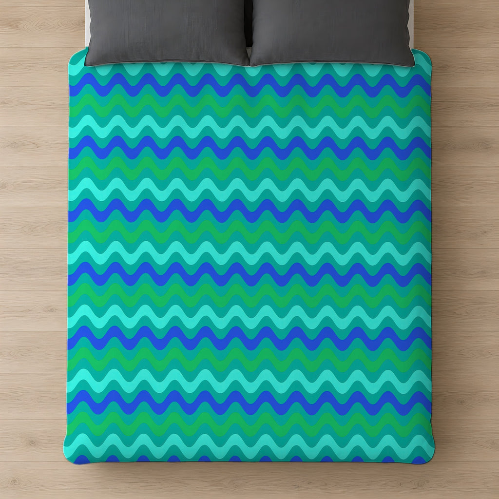 Big Ripple Chevrons Comforter on a bed, seen from above