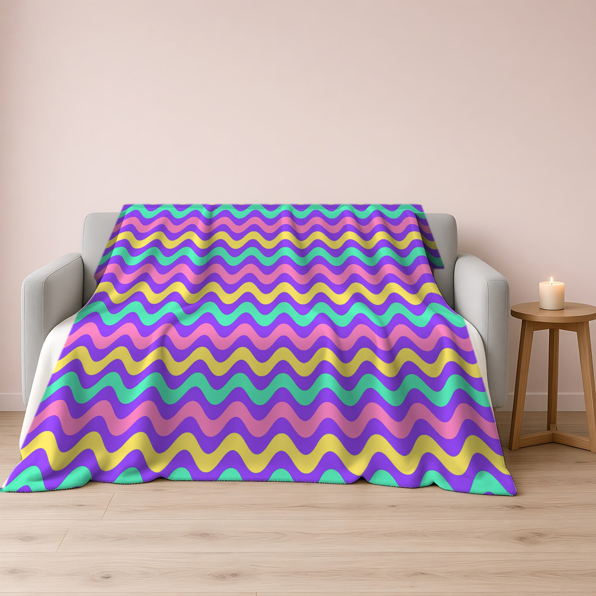 Big Ripple Chevrons Sherpa Fleece Blanket draped over a grey sofa