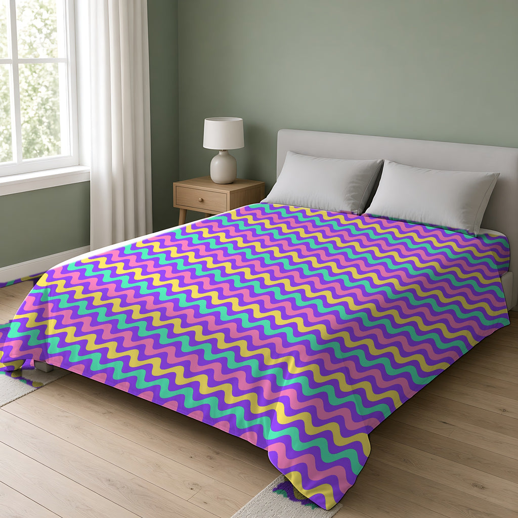 Big Ripple Chevrons Comforter on a double bed in a bright sage-green bedroom