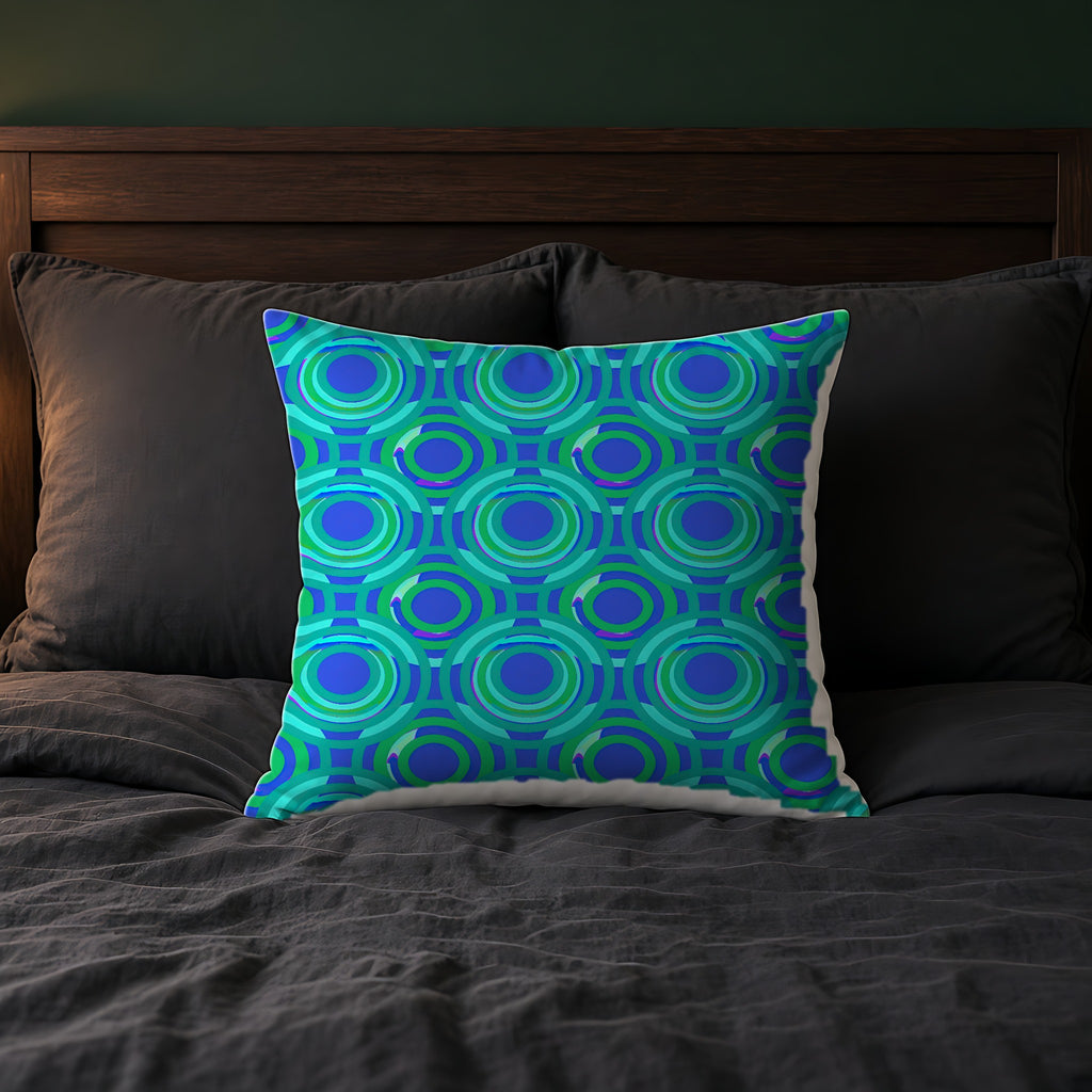 Interlocking Ring Ripples Faux Suede Cushion on a bed with charcoal bedding