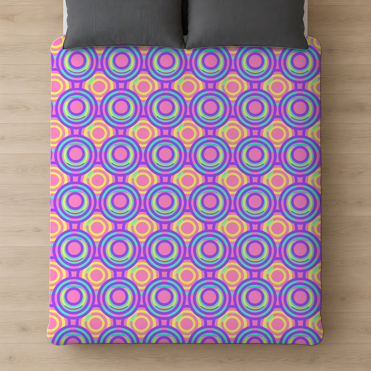 Interlocking Ring Ripples Comforter on a bed, seen from above