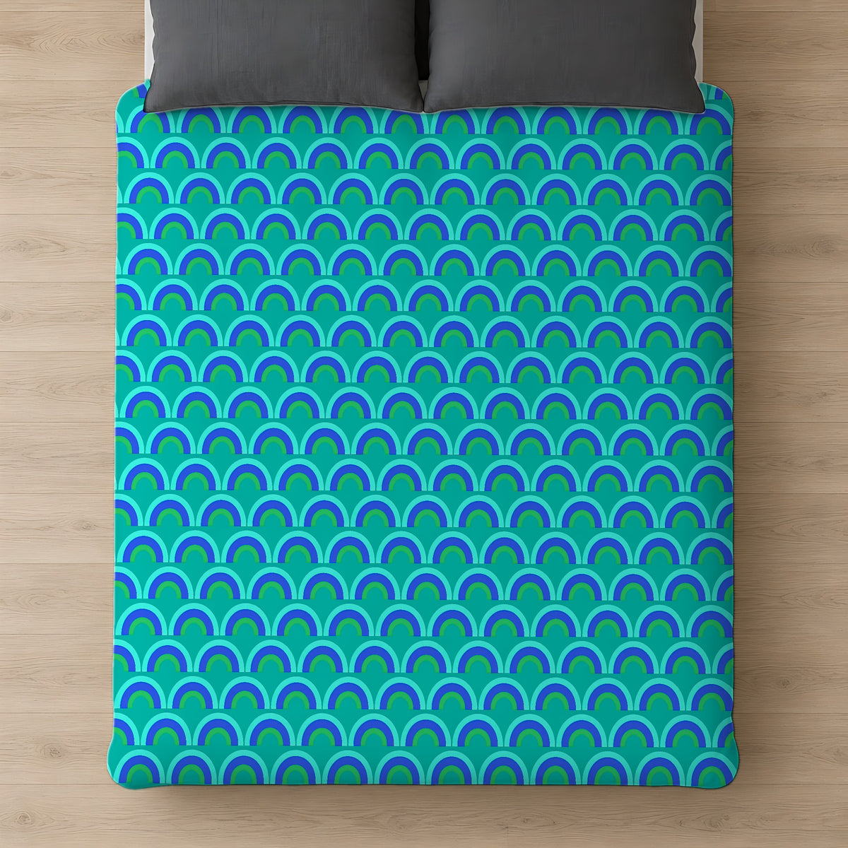 Chromatic Scallop Ripple Comforter on a bed, seen from above