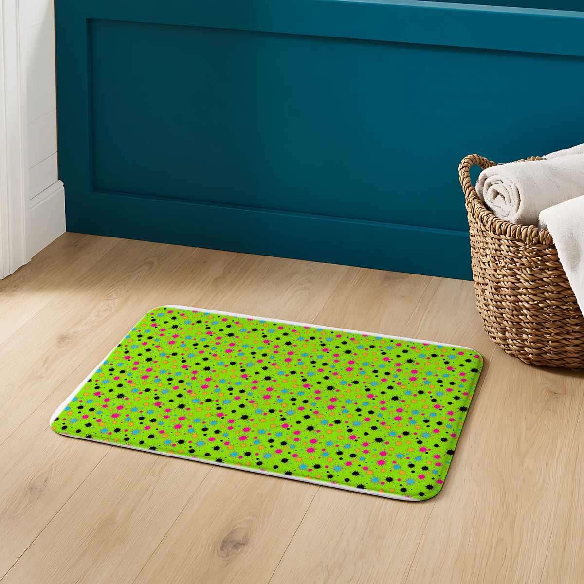 Splat Storm Bath Mat on an oak floor in a teal bathroom