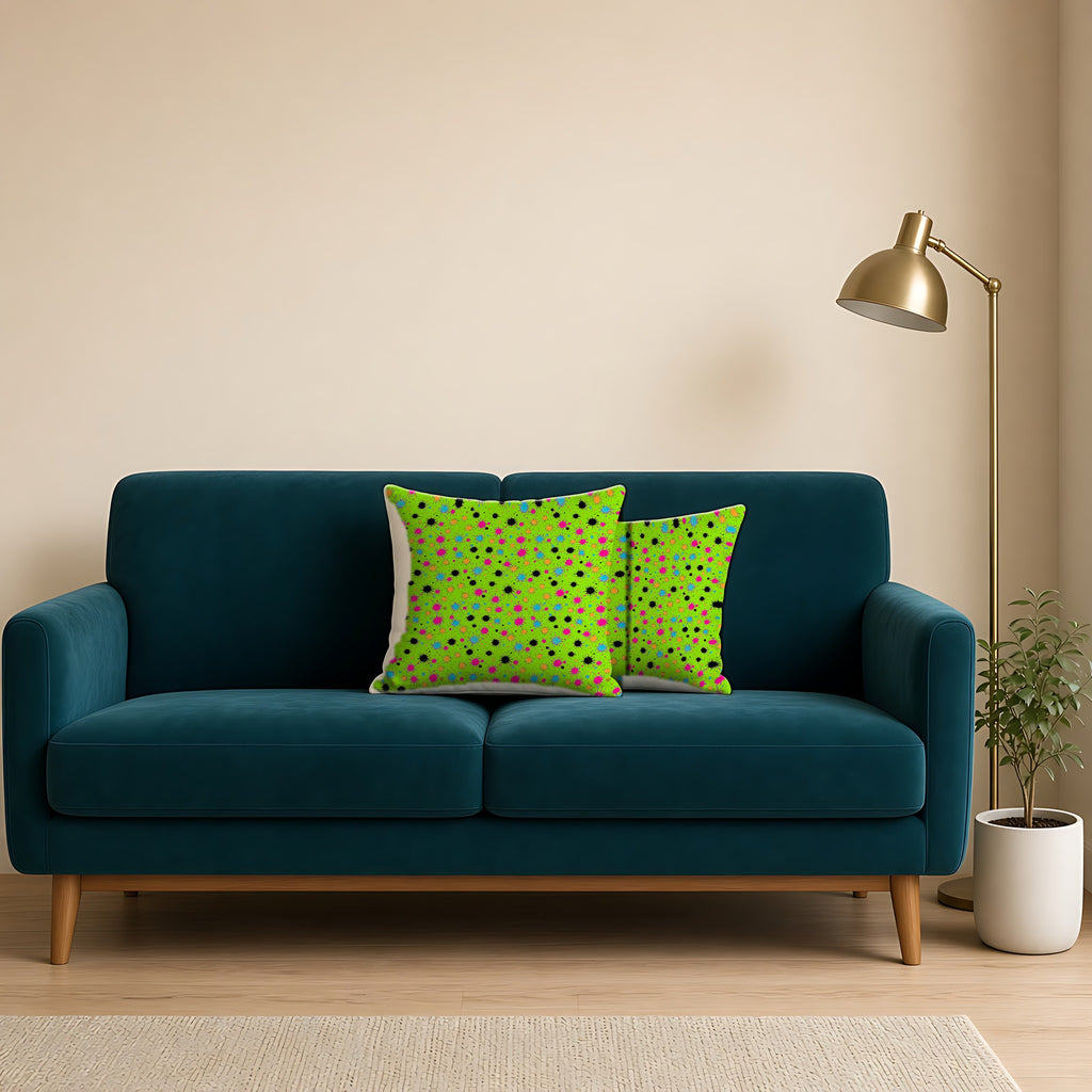 Splat Storm Faux Suede Cushion on a teal velvet sofa