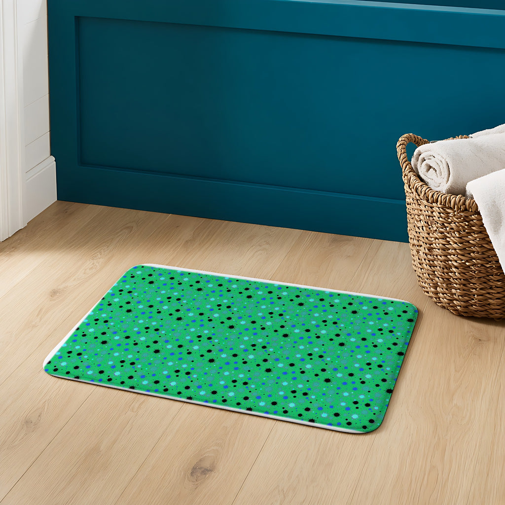 Splat Storm Bath Mat on an oak floor in a teal bathroom