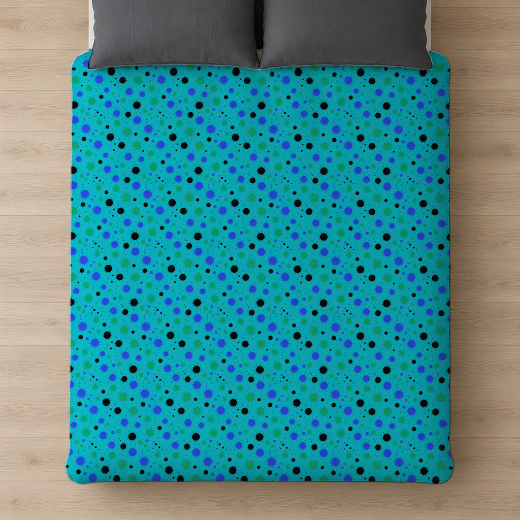 Blot Burst Cotton Duvet Cover on a bed, seen from above