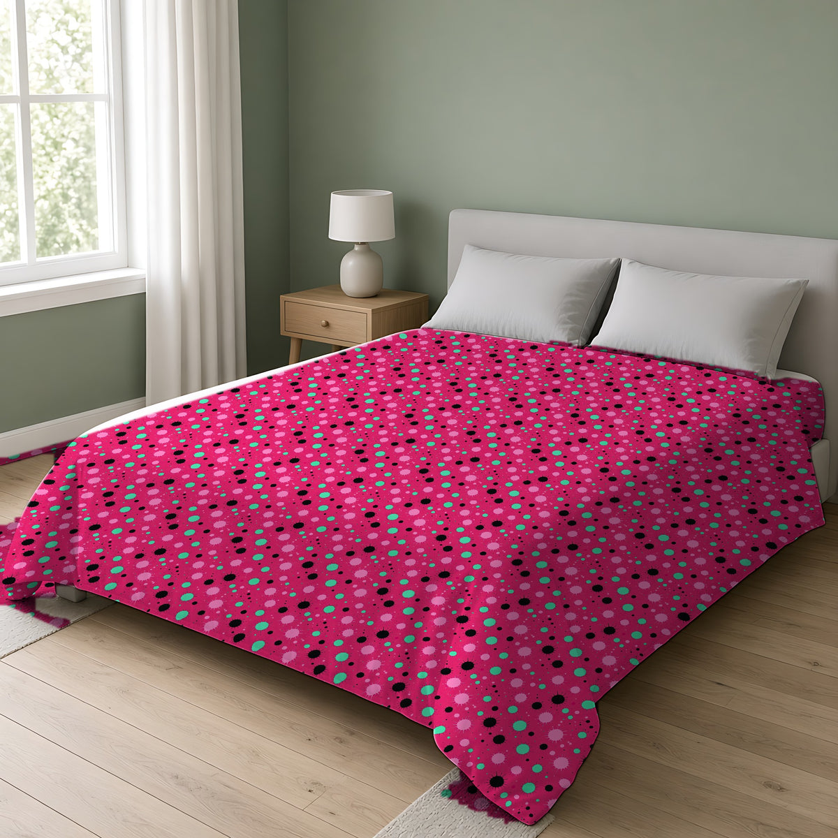 Blot Burst Cotton Duvet Cover on a double bed in a bright sage-green bedroom