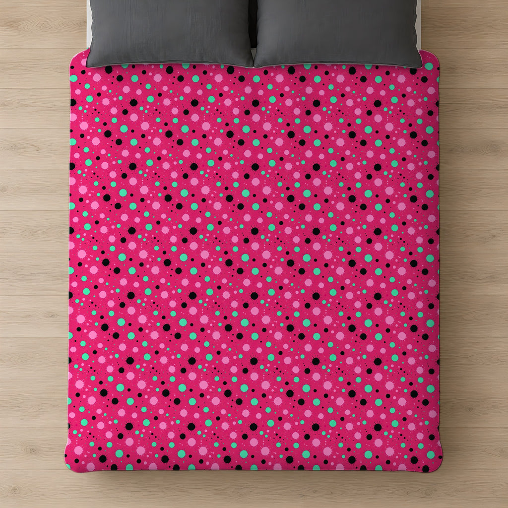 Blot Burst Cotton Duvet Cover on a bed, seen from above