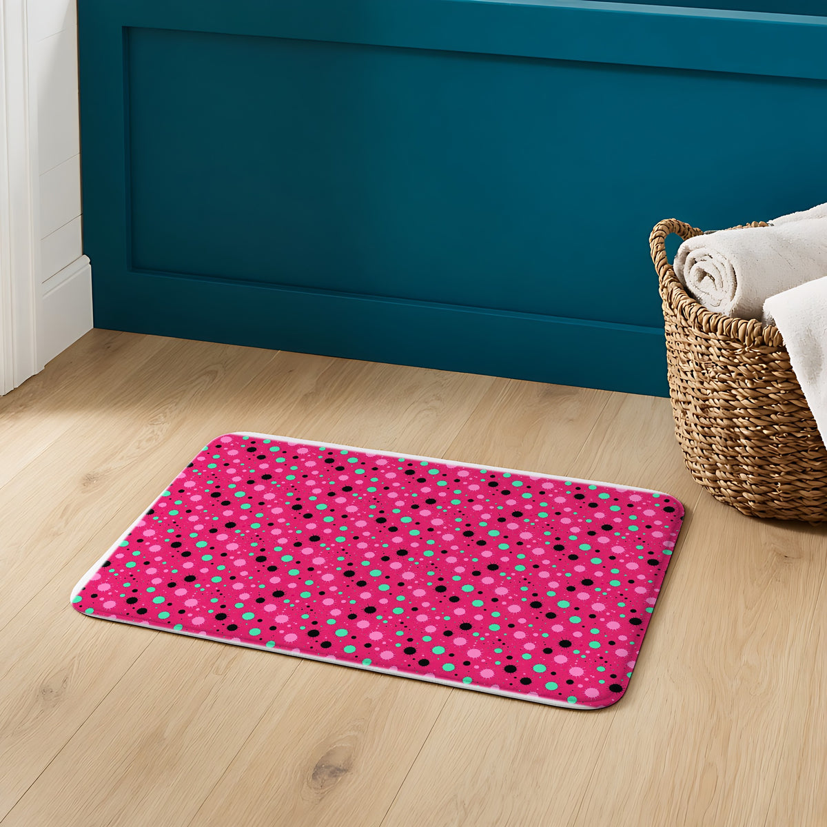 Blot Burst Bath Mat on an oak floor in a teal bathroom