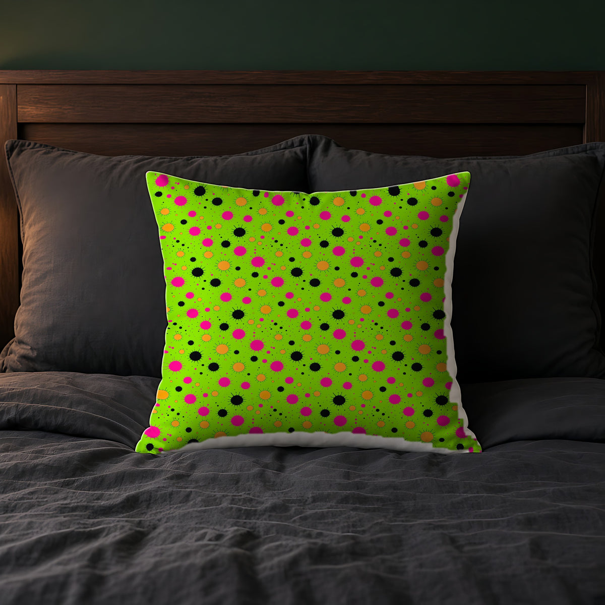 Blot Burst Faux Suede Cushion on a bed with charcoal bedding