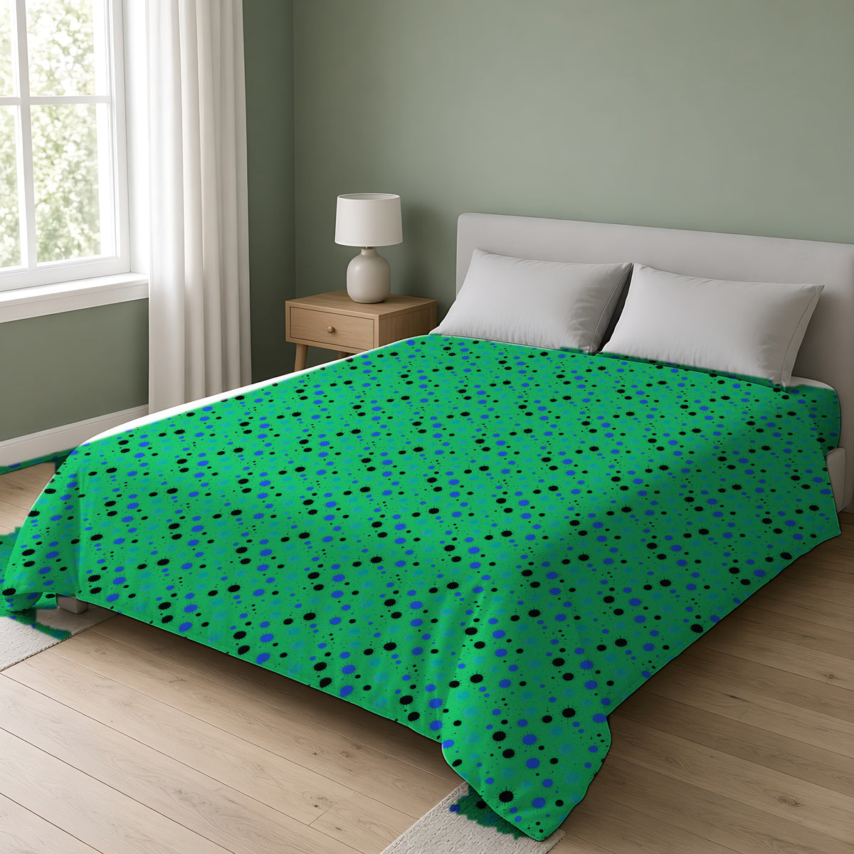 Blot Burst Cotton Duvet Cover on a double bed in a bright sage-green bedroom