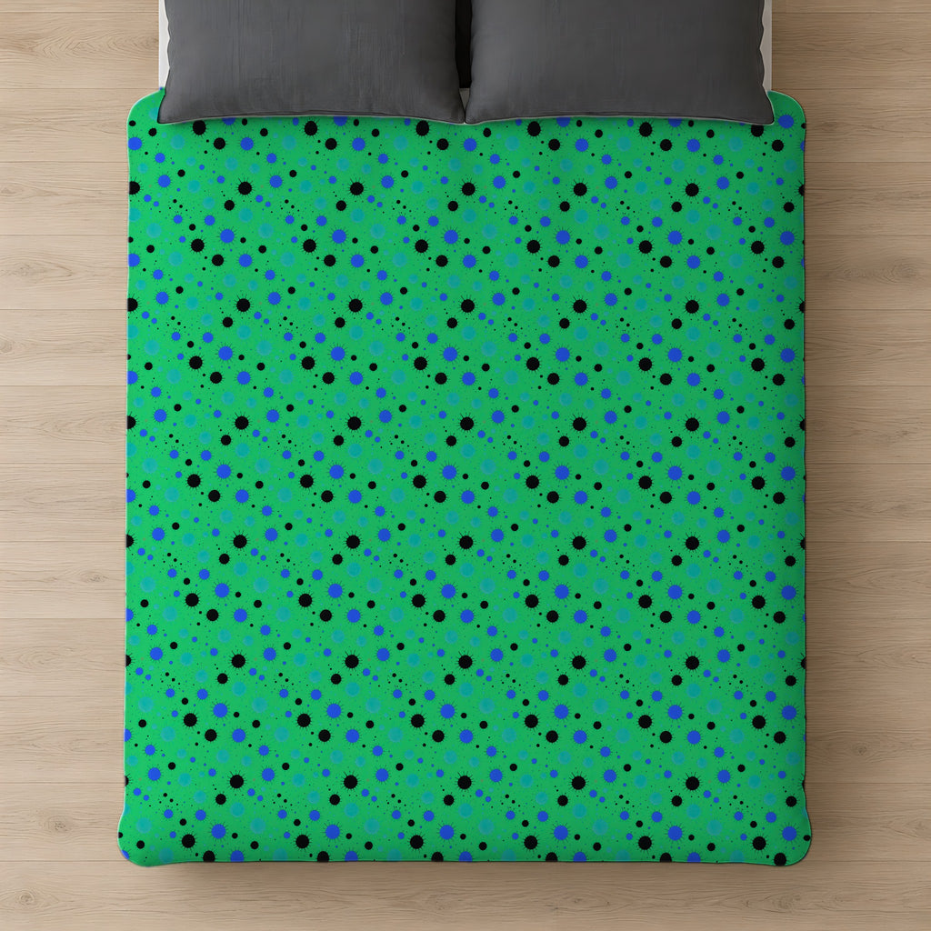 Blot Burst Cotton Duvet Cover on a bed, seen from above