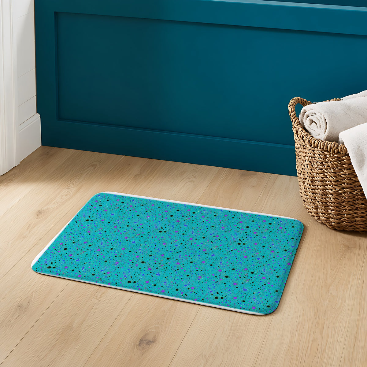 Spray Field Bath Mat on an oak floor in a teal bathroom