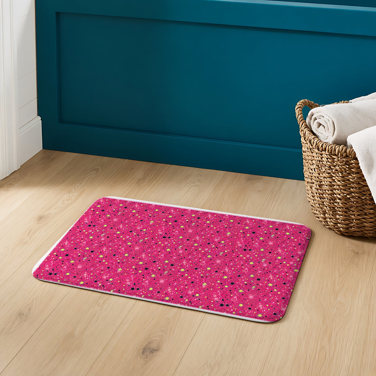 Pink Spray Field Bath Mat on an oak floor in a teal bathroom