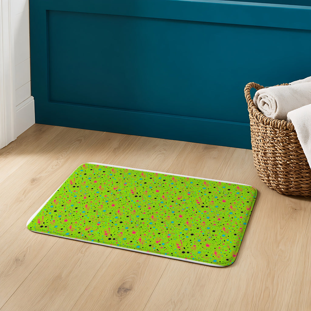 Pink Spray Field Bath Mat on an oak floor in a teal bathroom