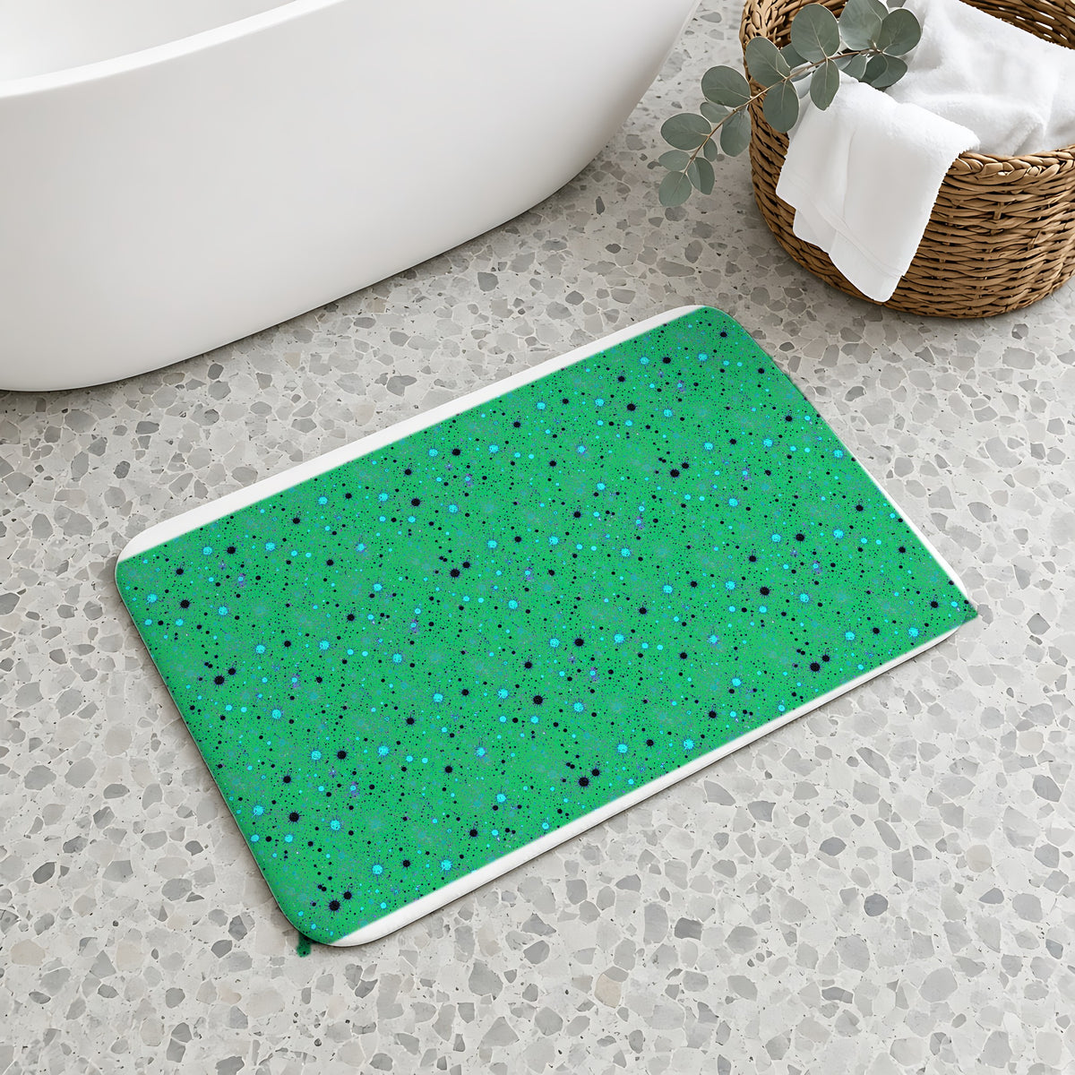 Spray Field Bath Mat on a terrazzo floor beside a freestanding bath