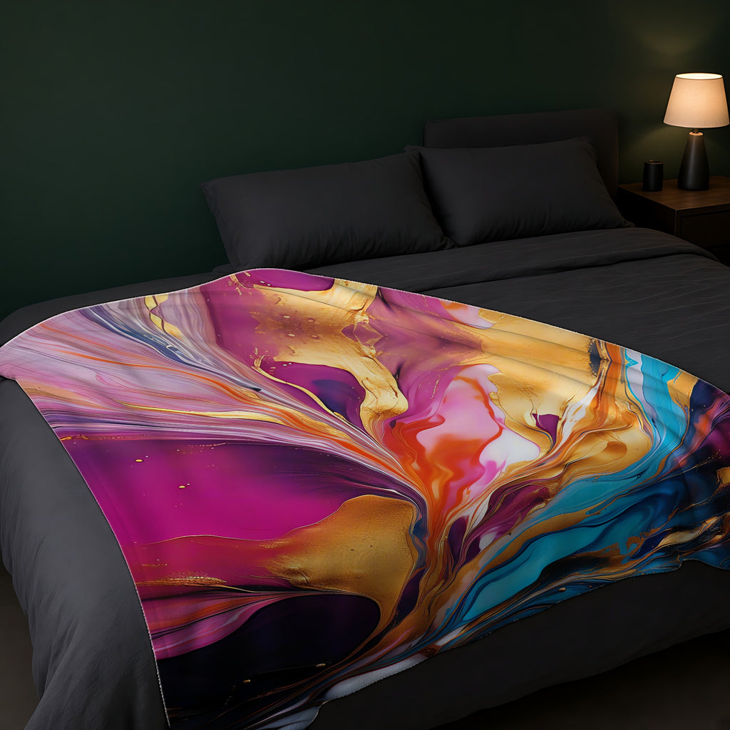 Gilded Fluid Swirl Sherpa Fleece Blanket across the foot of a dark bed