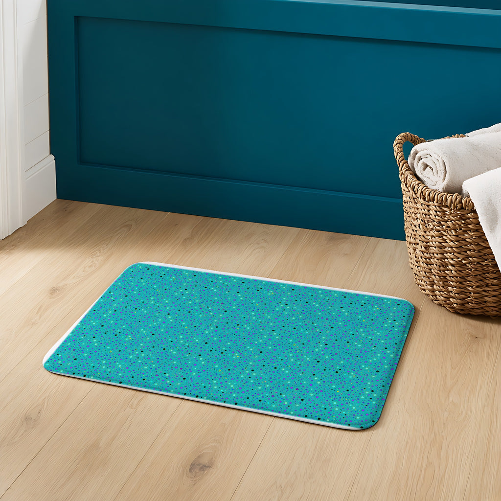 Confetti Spatter Bath Mat on an oak floor in a teal bathroom