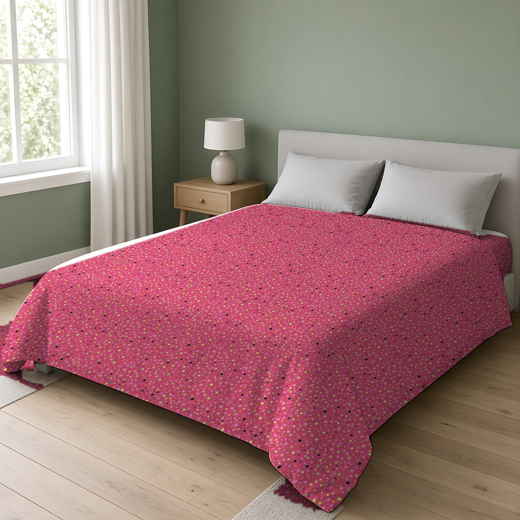 Confetti Spatter Cotton Duvet Cover on a double bed in a bright sage-green bedroom