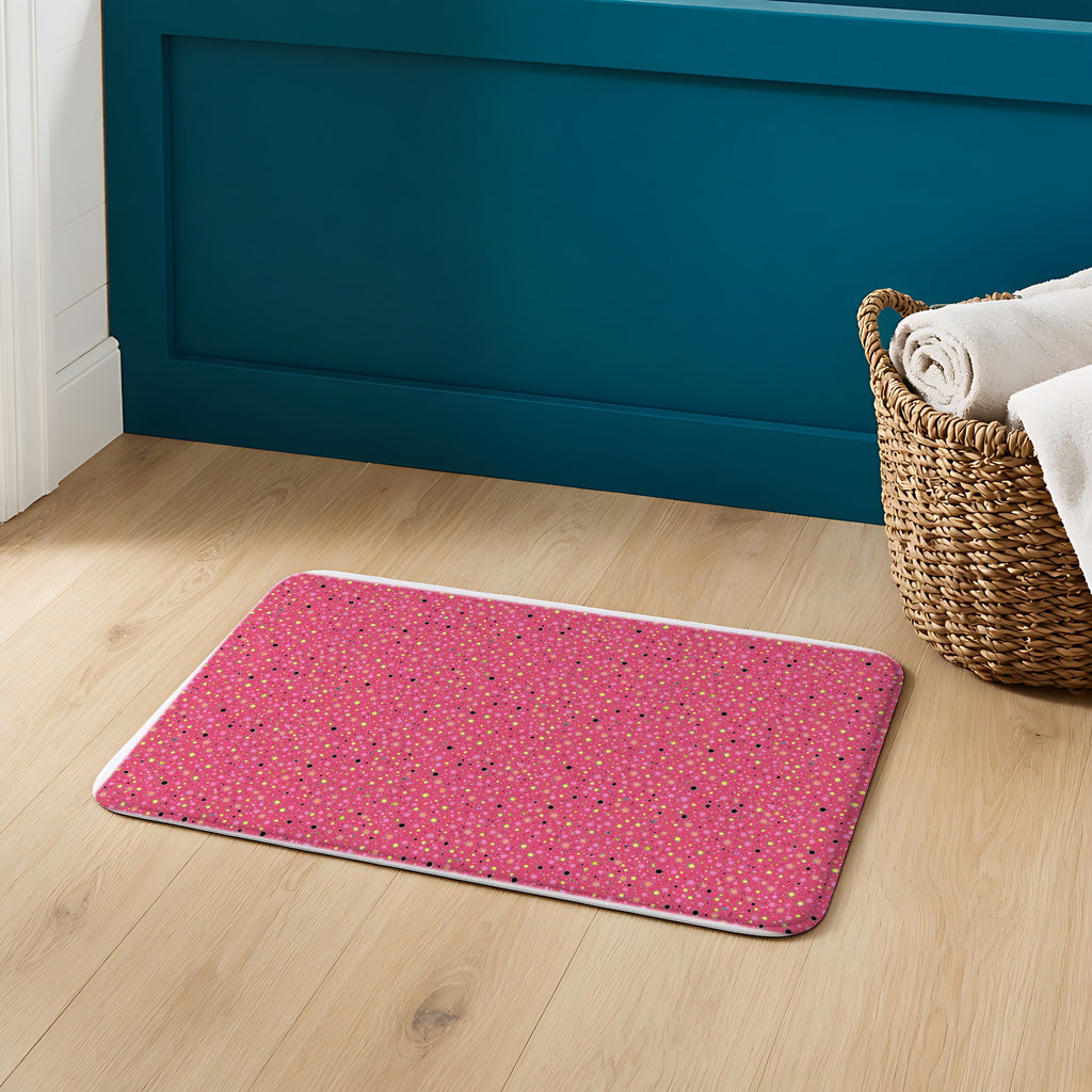 Confetti Spatter Bath Mat on an oak floor in a teal bathroom