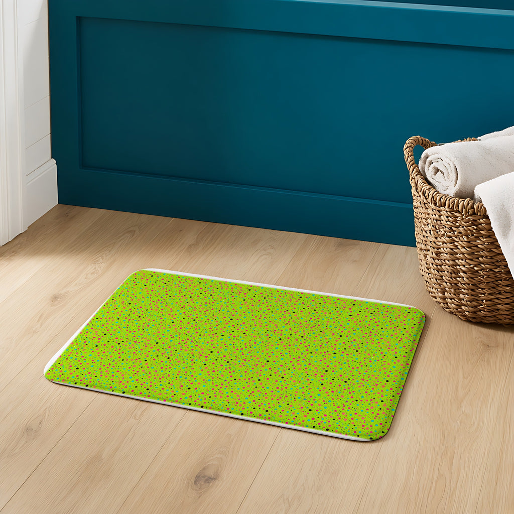 Confetti Spatter Bath Mat on an oak floor in a teal bathroom
