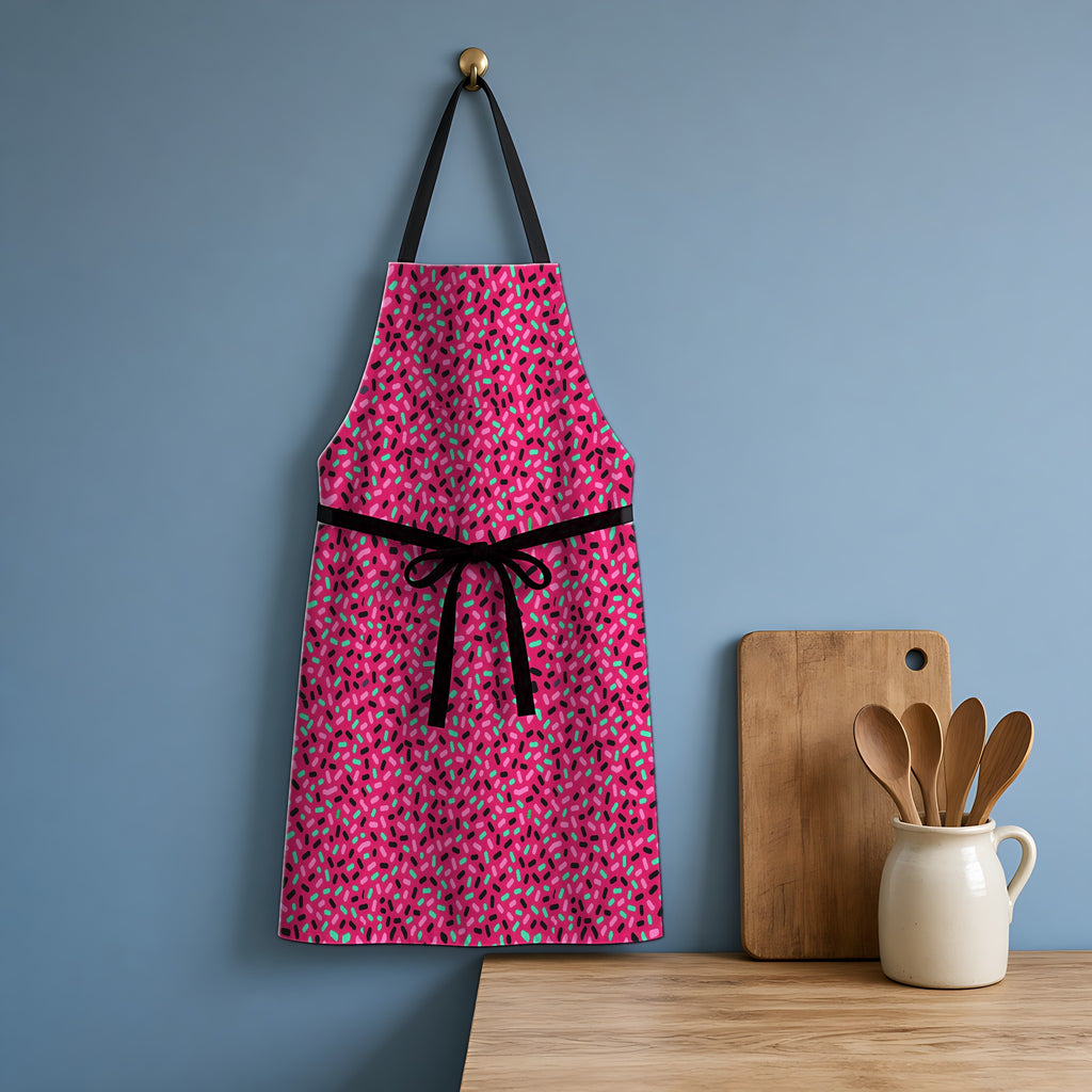 Sprinkle Pop Apron hanging in a blue kitchen