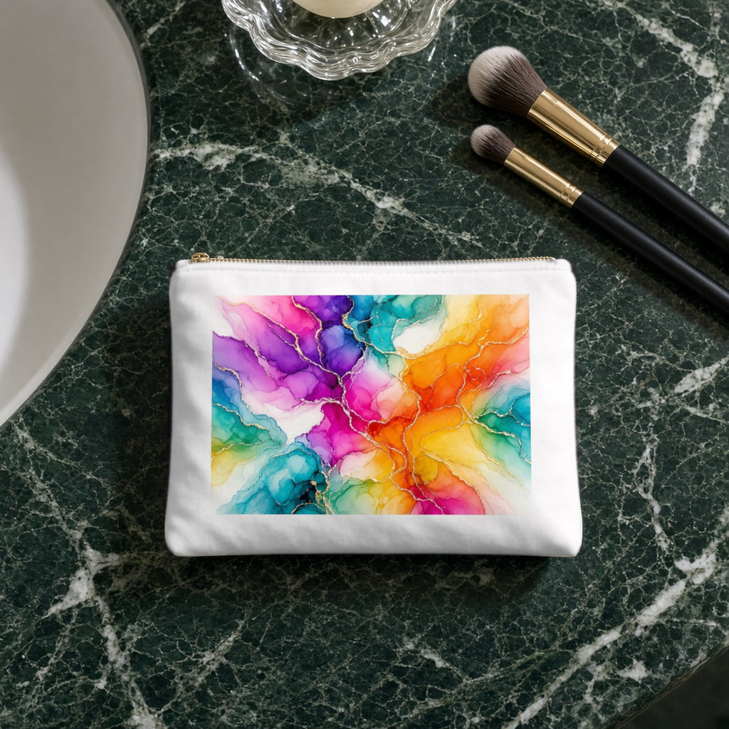 Rainbow Alcohol Ink Bloom canvas cosmetic bag on a green marble vanity