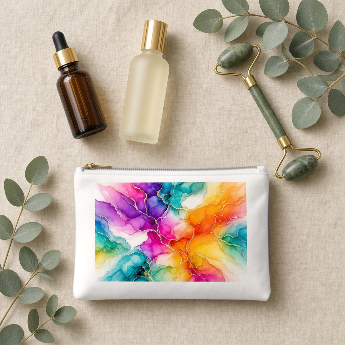 Rainbow Alcohol Ink Bloom canvas cosmetic bag on beige linen with skincare bottles