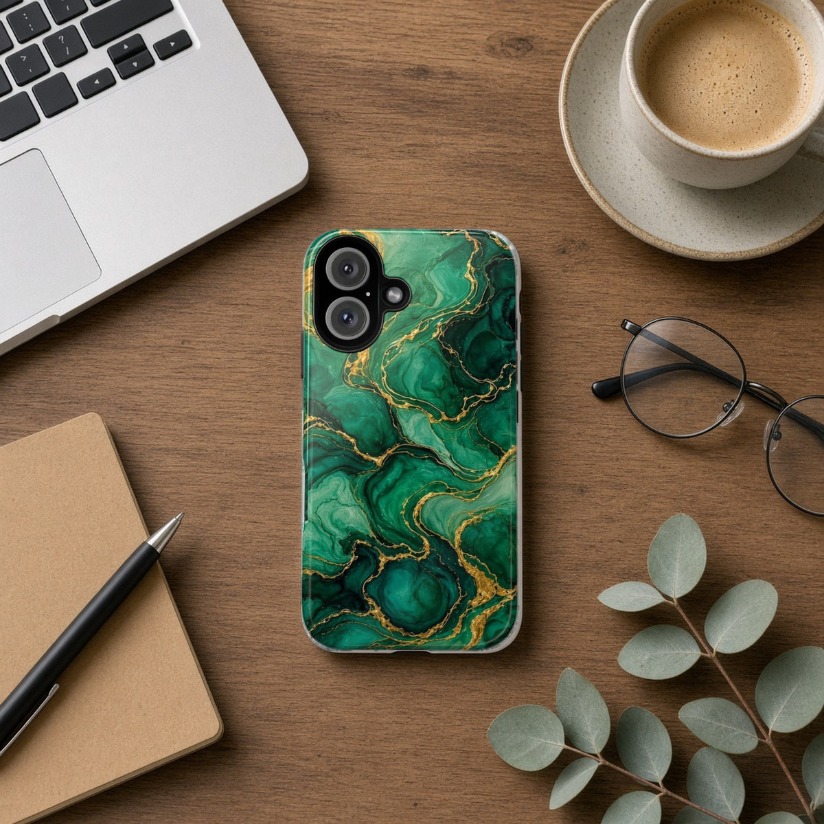 Emerald Tide-Pool Pour tough phone case on a wooden desk beside a laptop, coffee and eucalyptus