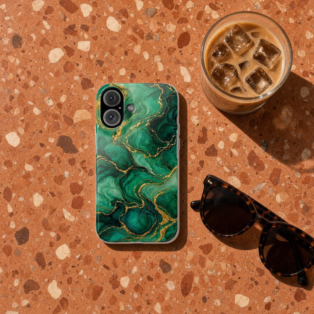 Emerald Tide-Pool Pour slim phone case on terrazzo with an iced coffee and sunglasses