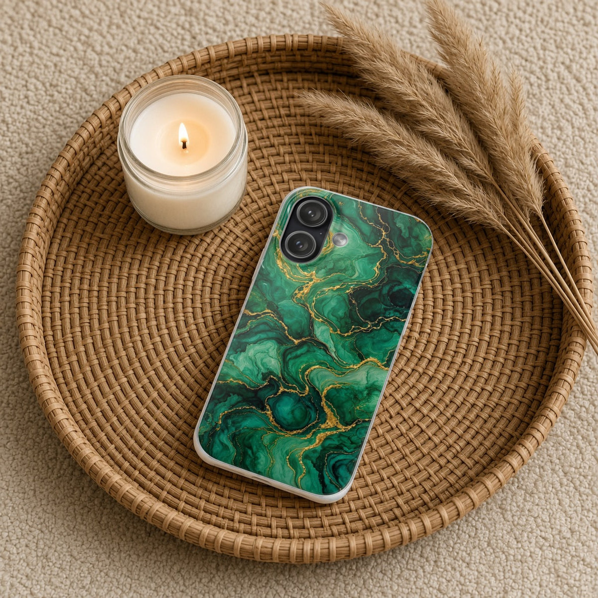 Emerald Tide-Pool Pour flexi phone case on a rattan tray with a candle and dried grasses