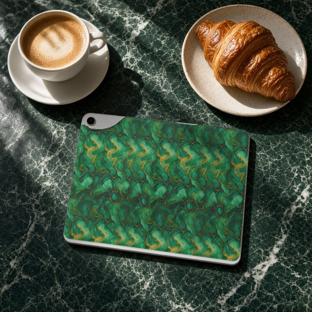 Emerald Tide-Pool Pour iPad folio case on a green marble cafe table with a cappuccino