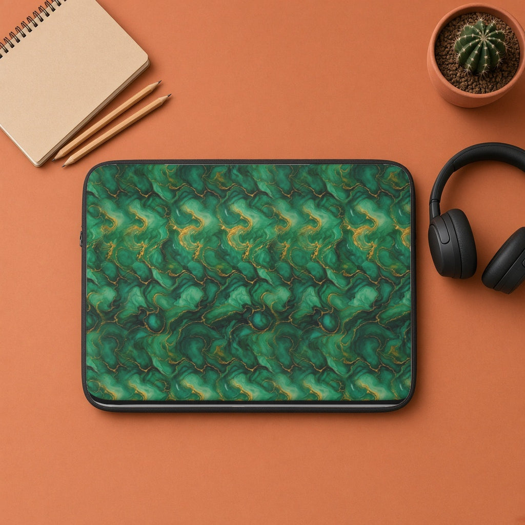 Emerald Tide-Pool Pour laptop sleeve flat lay on terracotta with headphones and a notebook