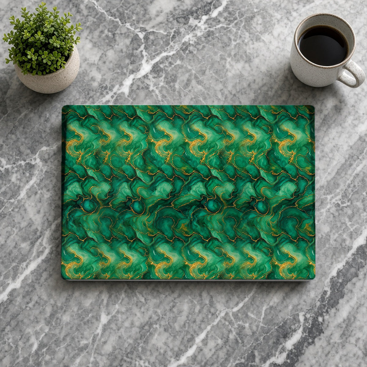 Emerald Tide-Pool Pour matte MacBook case from above on grey marble with coffee