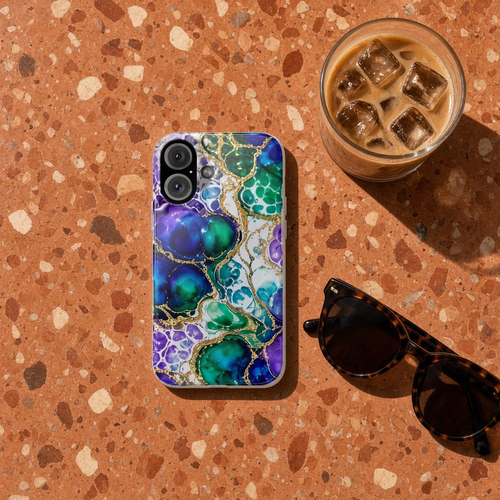 Peacock Acrylic Pour Cells slim phone case on terrazzo with an iced coffee and sunglasses