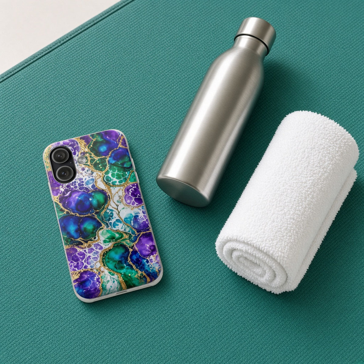 Peacock Acrylic Pour Cells flexi phone case on a teal yoga mat with a water bottle and towel