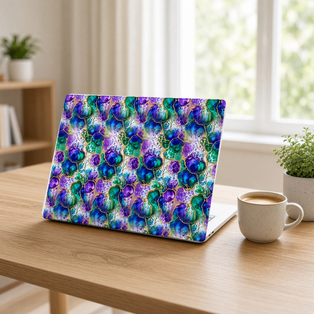 Peacock Acrylic Pour Cells matte MacBook case on an open laptop at a home office desk