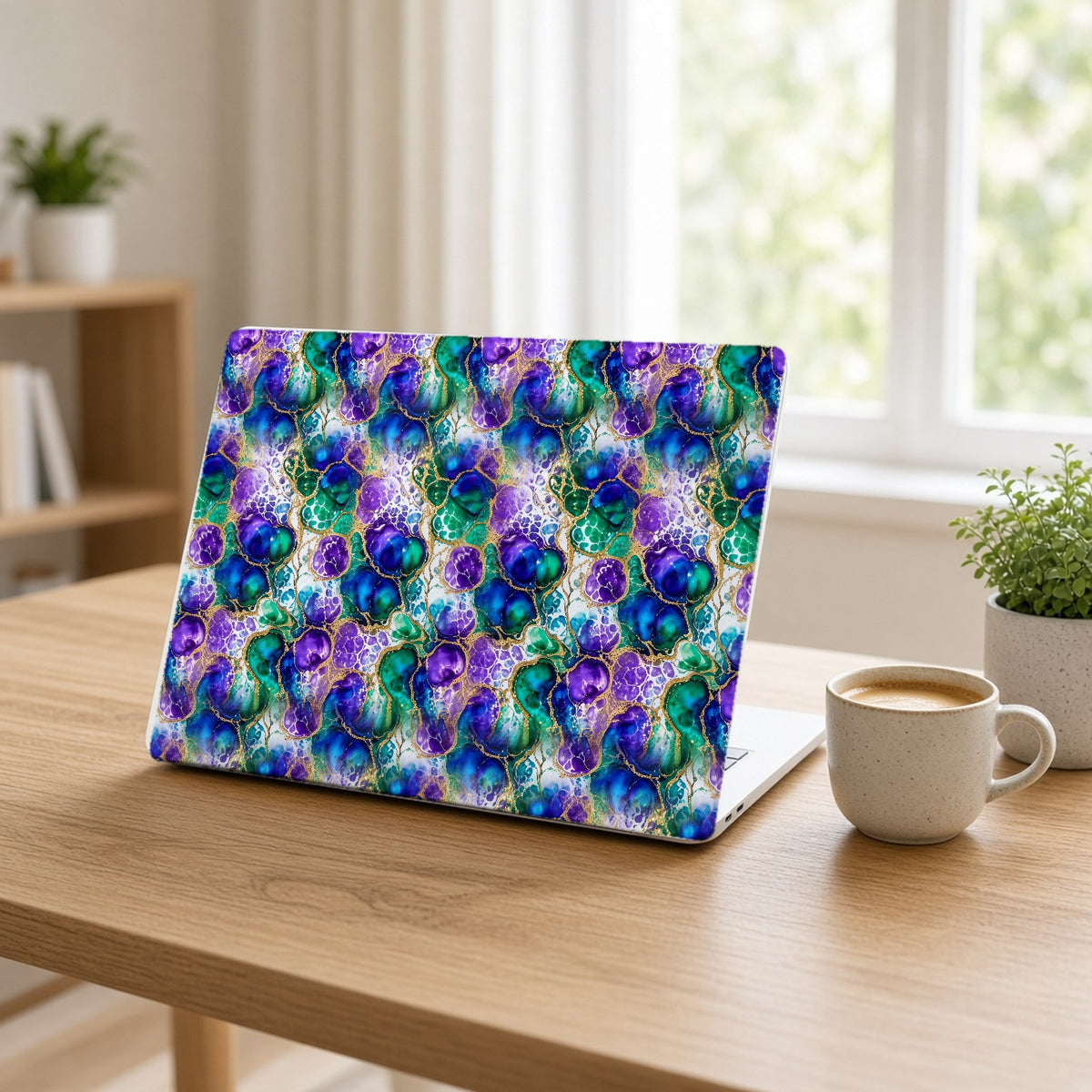 Peacock Acrylic Pour Cells matte MacBook case on an open laptop at a home office desk