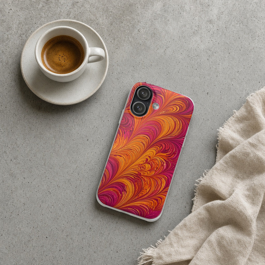 Sunset Feather Marbling flexi phone case on a concrete cafe table with an espresso