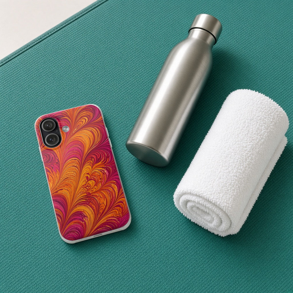 Sunset Feather Marbling flexi phone case on a teal yoga mat with a water bottle and towel